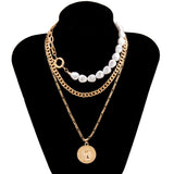 Paradise Lost Pearl Coin Pendant Necklace