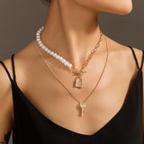 Paradise Lost Pearl Coin Pendant Necklace